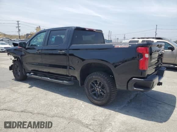 2024 Chevrolet Silverado 1500 Custom Trail Boss with VIN 3GCPDCEKXRG220933, listed as a Copart auction lot 60823785 with 20,577 mi miles and Salvage title. Bid and sale history available at DreamBid. Image 2.