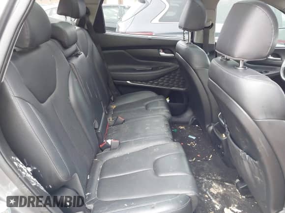 2019 Hyundai Santa Fe Limited with VIN 5NMS53AD9KH001597, listed as a IAAI auction lot 42372116 with 120,336 mi miles and . Bid and sale history available at DreamBid. Image 8.