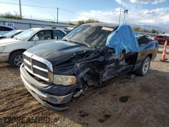 2003 Dodge 1500 ST with VIN 1D7HA16N03JS12810, listed as a Copart auction lot 68737335 with Not provided miles and Salvage title. Bid and sale history available at DreamBid. Image 1.