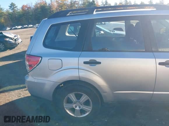 2012 Subaru Forester X z VIN JF2SHABC8CH409577, wystawiony jako IAAI lot #43490487 z przebiegiem 143 372 mil mil oraz . Historia ofert i sprzedaży dostępna na DreamBid. Obrazek 15.