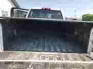 2016 Chevrolet Silverado 2500HD Work Truck with VIN 1GC1KUEG4GF287586, listed as a Copart auction lot 62509015 with 191,475 mi miles and Salvage title. Bid and sale history available at DreamBid. Image 6.