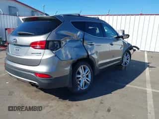 2013 Hyundai Santa Fe Sport with VIN 5XYZUDLA3DG077162, listed as a IAAI auction lot 43326274 with Not provided miles and . Bid and sale history available at DreamBid. Image 4.