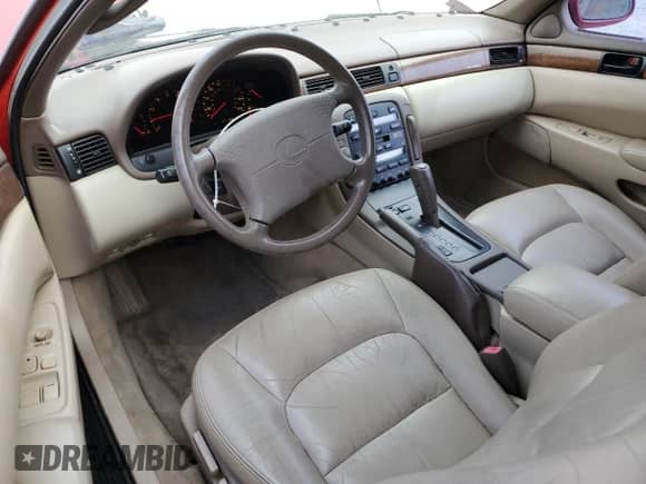 1996 Lexus SC 400 with VIN JT8CH32Y1T0051116, listed as a Copart auction lot 51518155 with 94,156 mi miles and Salvage title. Bid and sale history available at DreamBid. Image 8.