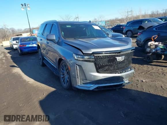 2021 Cadillac Escalade Premium Luxury with VIN 1GYS4CKL2MR231788, listed as a IAAI auction lot 41630686 with 56,672 mi miles and . Bid and sale history available at DreamBid. Image 1.