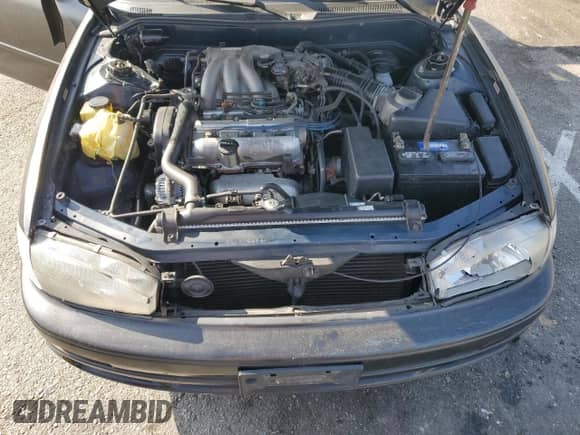 1992 Toyota Camry z VIN JT2VK12E2N0003464, wystawiony jako Copart lot #83446264 z przebiegiem 181 876 mil mil oraz Szkoda całkowita • Salvage title. Historia ofert i sprzedaży dostępna na DreamBid. Obrazek 12.