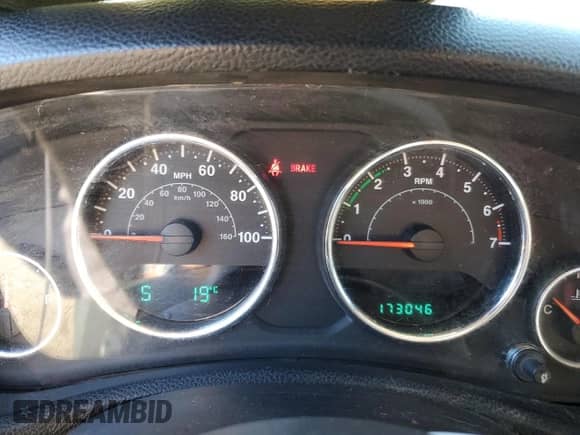 2012 Jeep Wrangler Sport with VIN 1C4AJWAG5CL113509, listed as a Copart auction lot 87483435 with 173,046 mi miles and Clean title. Bid and sale history available at DreamBid. Image 9.