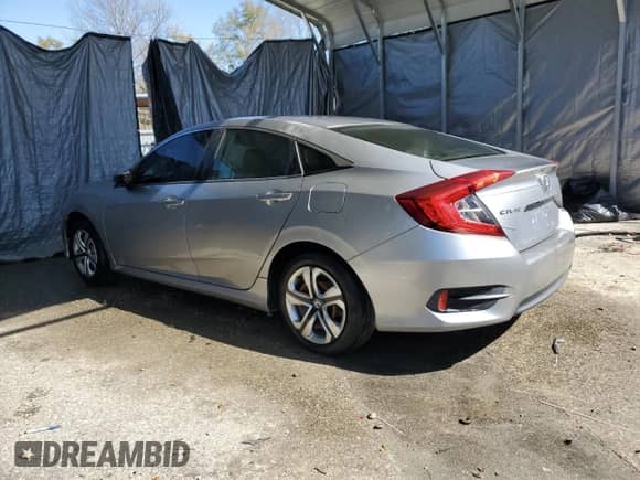 2016 Honda Civic LX z VIN 19XFC2F54GE081344, wystawiony jako Copart lot #43571544 z przebiegiem 118 096 mil mil oraz Czysty tytuł • Clean title. Historia ofert i sprzedaży dostępna na DreamBid. Obrazek 2.