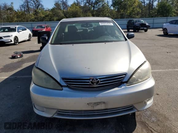 2005 Toyota Camry XLE with VIN 4T1BF30K05U595874, listed as a Copart auction lot 84923435 with 194,695 mi miles and Salvage title. Bid and sale history available at DreamBid. Image 5.