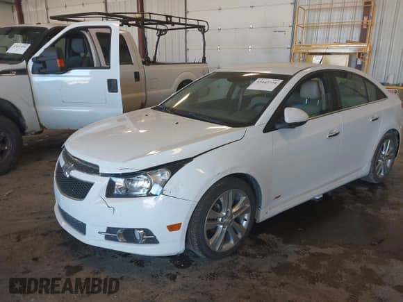 2013 Chevrolet Cruze LTZ with VIN 1G1PG5SB1D7327471, listed as a IAAI auction lot 43443774 with 184,344 mi miles and . Bid and sale history available at DreamBid. Image 2.