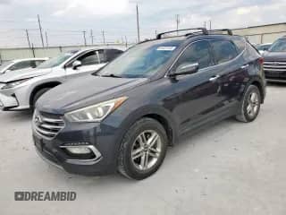2018 Hyundai Santa Fe 2.4L с VIN 5XYZU3LB3JG503592, выставлен на аукционе Copart как лот 81327215 с пробегом 168 074 миль миль и Списание • Salvage title. История ставок и продаж доступна на DreamBid. Изображение 1.