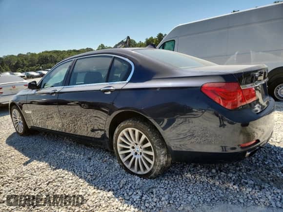 2012 BMW 7 Series 750Li xDrive with VIN WBAKC8C52CC435656, listed as a Copart auction lot 80033325 with 129,043 mi miles and Clean title. Bid and sale history available at DreamBid. Image 2.