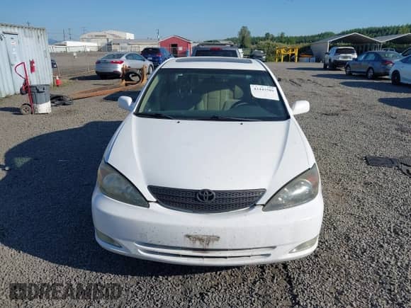 2002 Toyota Camry LE z VIN JTDBE32K820050500, wystawiony jako IAAI lot #42443589 z przebiegiem 262 287 mil mil oraz . Historia ofert i sprzedaży dostępna na DreamBid. Obrazek 12.