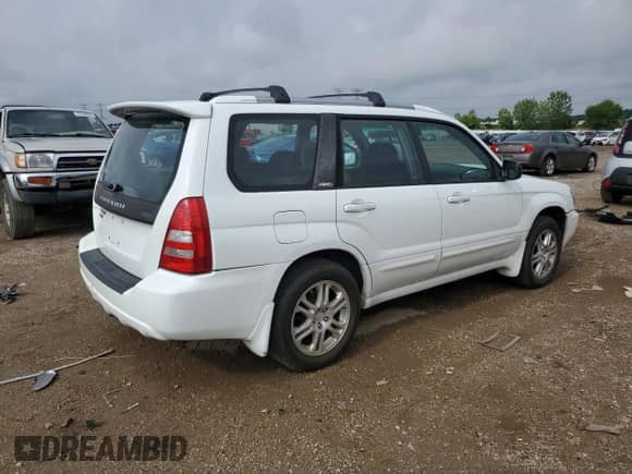 2004 Subaru Forester XT with VIN JF1SG69614H724341, listed as a Copart auction lot 61068405 with 151,830 mi miles and Salvage title. Bid and sale history available at DreamBid. Image 3.