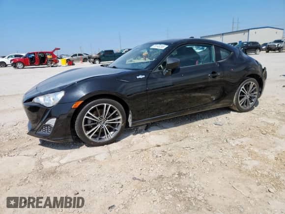2015 Scion FR-S z VIN JF1ZNAA11F9708032, wystawiony jako Copart lot #70145265 z przebiegiem 88 883 mil mil oraz Szkoda całkowita • Salvage title. Historia ofert i sprzedaży dostępna na DreamBid. Obrazek 1.