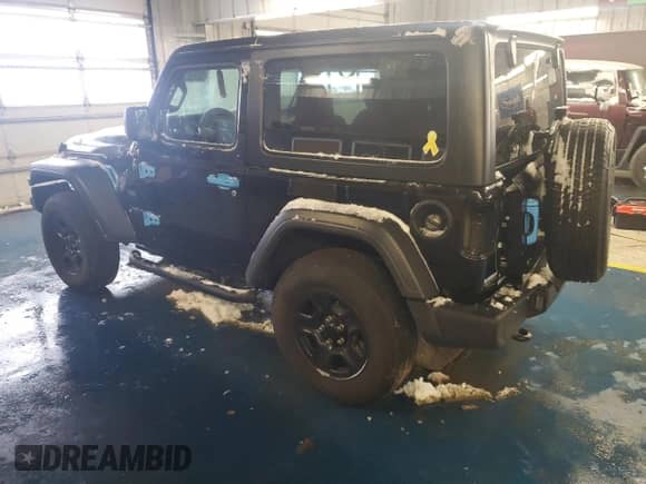 2023 Jeep Wrangler Sport with VIN 1C4GJXAN8PW617295, listed as a Copart auction lot 88292305 with 6,354 mi miles and Salvage title. Bid and sale history available at DreamBid. Image 2.