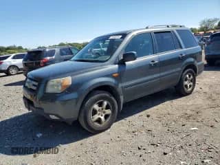 2006 Honda Pilot EX-L with VIN 2HKYF187X6H544056, listed as a Copart auction lot 71182015 with 272,411 mi miles and Salvage title. Bid and sale history available at DreamBid. Image 1.