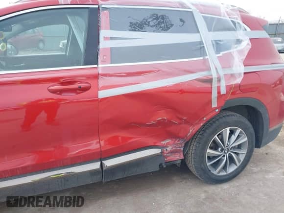 2019 Hyundai Santa Fe SEL with VIN 5NMS33AD2KH062604, listed as a IAAI auction lot 41543643 with 74,407 mi miles and . Bid and sale history available at DreamBid. Image 6.