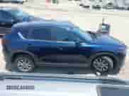 2023 Mazda CX-5 S Preferred z VIN JM3KFBCM4P0257505, wystawiony jako IAAI lot #42595704 z przebiegiem Nie podano mil oraz . Historia ofert i sprzedaży dostępna na DreamBid. Obrazek 12.