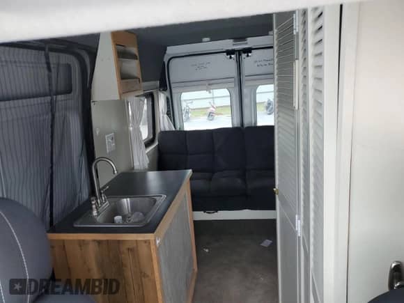 2016 Ram ProMaster Cargo с VIN 3C6TRVCG2GE127107, выставлен на аукционе Copart как лот 50260185 с пробегом 72 594 миль миль и Списание • Salvage title. История ставок и продаж доступна на DreamBid. Изображение 10.