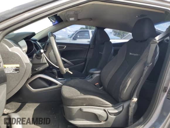 2015 Hyundai Veloster z VIN KMHTC6AD5FU227447, wystawiony jako Copart lot #82209535 z przebiegiem 164 485 mil mil oraz Czysty tytuł • Clean title. Historia ofert i sprzedaży dostępna na DreamBid. Obrazek 7.