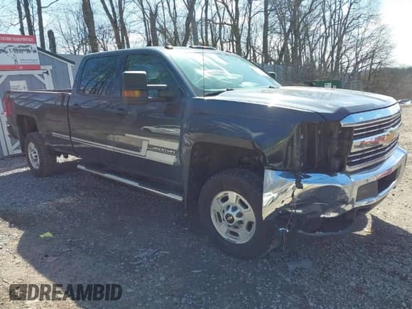 2017 Chevrolet Silverado 2500HD Work Truck z VIN 1GC1KUEG0HF219674, wystawiony jako IAAI lot #41883430 z przebiegiem 94 113 mil mil oraz . Historia ofert i sprzedaży dostępna na DreamBid. Obrazek 1.