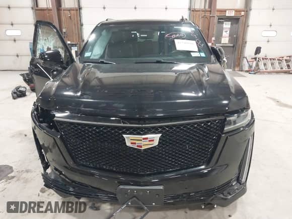 2023 Cadillac Escalade ESV 4WD Sport Platinum with VIN 1GYS4RKL1PR156900, listed as a IAAI auction lot 41740946 with 99,999 mi miles and . Bid and sale history available at DreamBid. Image 12.