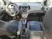 2013 Chevrolet Sonic LTZ с VIN 1G1JE5SH6D4114209, выставлен на аукционе Copart как лот 44854675 с пробегом 130 385 миль миль и Чистый • Clean title. История ставок и продаж доступна на DreamBid. Изображение 8.