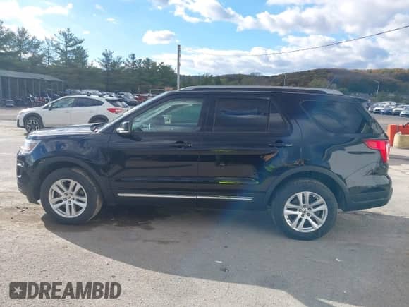 2018 Ford Explorer XLT with VIN 1FM5K8D86JGC80025, listed as a IAAI auction lot 43466697 with 93,264 mi miles and . Bid and sale history available at DreamBid. Image 14.