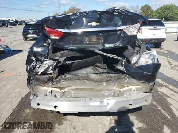 2018 Chevrolet Impala LT z VIN 2G1105S3XJ9123801, wystawiony jako Copart lot #84521405 z przebiegiem 106 150 mil mil oraz Szkoda całkowita • Salvage title. Historia ofert i sprzedaży dostępna na DreamBid. Obrazek 6.