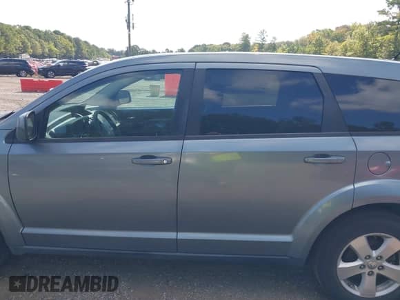 2009 Dodge Journey SXT with VIN 3D4GG57V39T574975, listed as a IAAI auction lot 43109367 with 170,643 mi miles and . Bid and sale history available at DreamBid. Image 14.