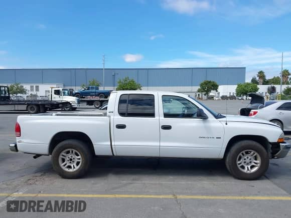 2001 Dodge Dakota Sport with VIN 1B7GL2AN81S196934, listed as a IAAI auction lot 42817890 with 349,534 mi miles and . Bid and sale history available at DreamBid. Image 13.