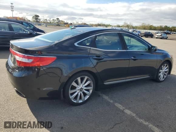 2013 Hyundai Azera z VIN KMHFH4JG9DA221002, wystawiony jako Copart lot #90937405 z przebiegiem 164 253 mil mil oraz Czysty tytuł • Clean title. Historia ofert i sprzedaży dostępna na DreamBid. Obrazek 3.