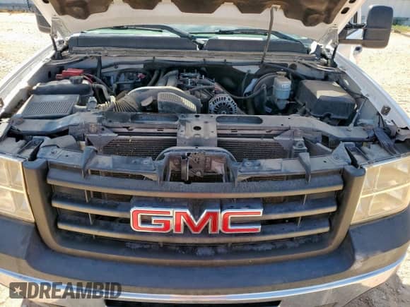 2012 GMC Sierra 1500 Work Truck z VIN 1GTN1TEA7CZ244671, wystawiony jako Copart lot #71821905 z przebiegiem 158 693 mil mil oraz Szkoda całkowita • Salvage title. Historia ofert i sprzedaży dostępna na DreamBid. Obrazek 11.