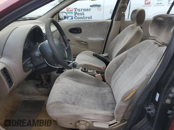 1998 Saturn SL with VIN 1G8ZK5271WZ179625, listed as a Copart auction lot 50878255 with 180,085 mi miles and Salvage title. Bid and sale history available at DreamBid. Image 7.