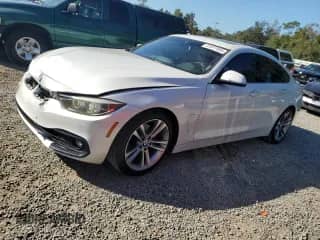 2018 BMW 4 Series 430i with VIN WBA4J1C52JBG78167, listed as a Copart auction lot 87077885 with 114,182 mi miles and Salvage title. Bid and sale history available at DreamBid. Image 1.