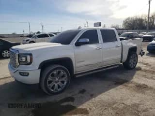 2017 GMC Sierra 1500 Denali with VIN 3GTP1PEC1HG258526, listed as a Copart auction lot 50223725 with 130,337 mi miles and Salvage title. Bid and sale history available at DreamBid. Image 1.