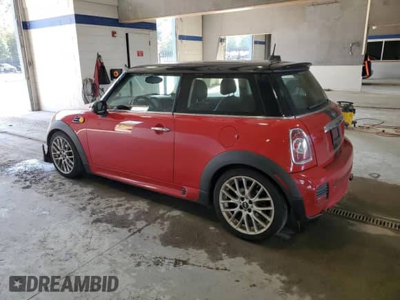 2012 MINI Hardtop with VIN WMWSU3C57CT185881, listed as a Copart auction lot 83754225 with 135,666 mi miles and Clean title. Bid and sale history available at DreamBid. Image 2.