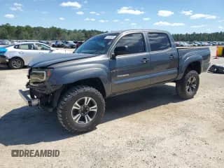 2010 Toyota Tacoma PreRunner z VIN 3TMJU4GN7AM107109, wystawiony jako Copart lot #70643565 z przebiegiem 260 111 mil mil oraz Szkoda całkowita • Salvage title. Historia ofert i sprzedaży dostępna na DreamBid. Obrazek 1.