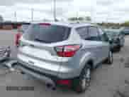 2017 Ford Escape Titanium with VIN 1FMCU9JD7HUD37482, listed as a IAAI auction lot 43451288 with 68,157 mi miles and . Bid and sale history available at DreamBid. Image 4.