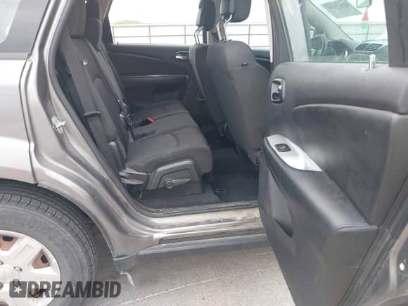 2012 Dodge Journey American Value with VIN 3C4PDCAB8CT206985, listed as a IAAI auction lot 42529224 with 129,359 mi miles and . Bid and sale history available at DreamBid. Image 8.