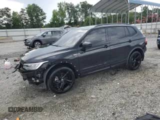 2023 Volkswagen Tiguan SE R-Line Black с VIN 3VVCB7AX5PM115066, выставлен на аукционе Copart как лот 65738555 с пробегом 31 897 миль миль и Списание • Salvage title. История ставок и продаж доступна на DreamBid. Изображение 1.