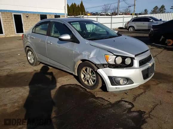 2012 Chevrolet Sonic LS с VIN 1G1JB5SH8C4112274, выставлен на аукционе Copart как лот 48847175 с пробегом Не указан миль и Списание • Salvage title. История ставок и продаж доступна на DreamBid. Изображение 11.