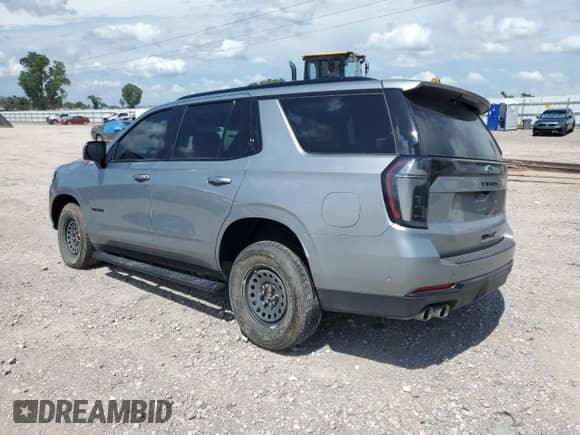 2025 Chevrolet Tahoe Z71 with VIN 1GNS6PRD5SR172052, listed as a Copart auction lot 62943195 with 7,858 mi miles and Salvage title. Bid and sale history available at DreamBid. Image 2.