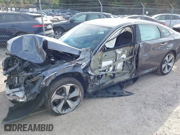 2019 Honda Accord Touring с VIN 1HGCV2F92KA027845, выставлен на аукционе IAAI как лот 43362070 с пробегом Не указан миль и . История ставок и продаж доступна на DreamBid. Изображение 16.