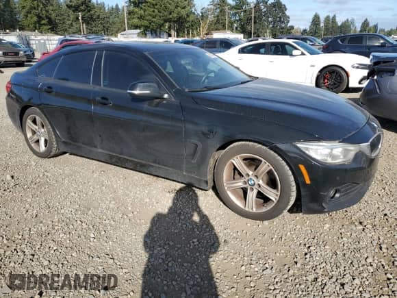 2015 BMW 4 Series 428i z VIN WBA4A5C59FG051335, wystawiony jako Copart lot #82312585 z przebiegiem 157 280 mil mil oraz Czysty tytuł • Clean title. Historia ofert i sprzedaży dostępna na DreamBid. Obrazek 4.