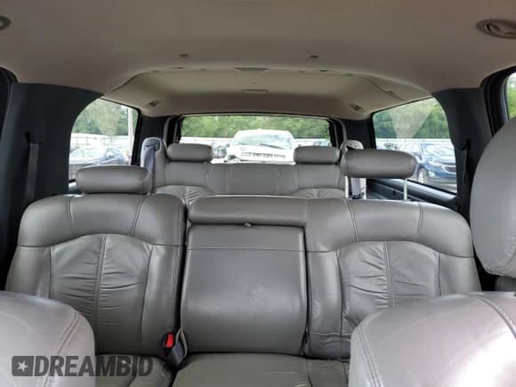 2000 Chevrolet Suburban LT z VIN 3GNFK16T4YG157766, wystawiony jako Copart lot #56097635 z przebiegiem 209 755 mil mil oraz Szkoda całkowita • Salvage title. Historia ofert i sprzedaży dostępna na DreamBid. Obrazek 10.