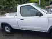 1998 Nissan Frontier XE with VIN 1N6DD21S6WC318243, listed as a IAAI auction lot 42272754 with 201,315 mi miles and . Bid and sale history available at DreamBid. Image 13.