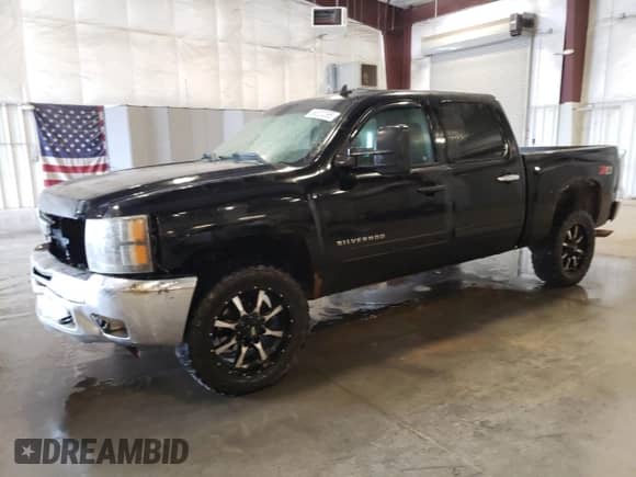 2012 Chevrolet Silverado 1500 LT с VIN 1GCPKSE75CF113020, выставлен на аукционе Copart как лот 68820295 с пробегом 196 658 миль миль и Списание • Salvage title. История ставок и продаж доступна на DreamBid. Изображение 1.