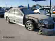 2003 Saturn LS with VIN 1G8JU54F33Y527678, listed as a Copart auction lot 82564405 with 114,235 mi miles and Salvage title. Bid and sale history available at DreamBid. Image 4.