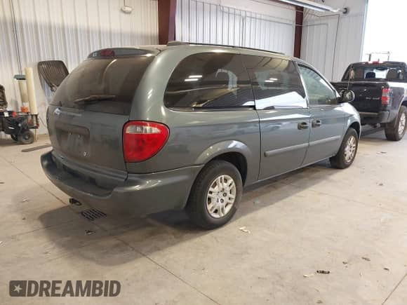 2005 Dodge Caravan SE with VIN 1D4GP24R05B206321, listed as a IAAI auction lot 43407335 with 206,806 mi miles and . Bid and sale history available at DreamBid. Image 4.